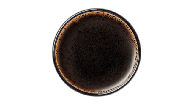 Glass of dark stout beer top view with foam. Isolated on white background.