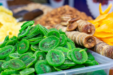 A seller selling delicious Afghan dry fruits snacks items at Industrial trade fair in Kolkata, West...