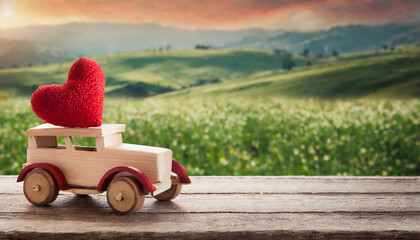 Valentine's day holiday celebration with a wooden toy car and heart shape, countryside
