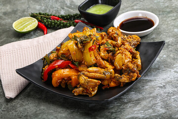 Vietnamese cuisine - fried frog with vegetables