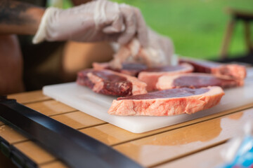 Food lover at Camping! Cooking food during camping at natural lake and mountain view background. Recreation and journey outdoor activity lifestyle.