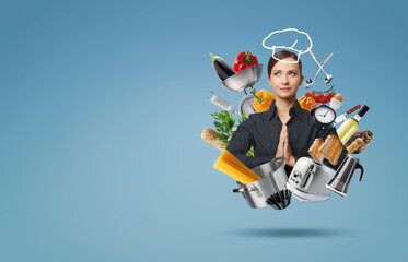 Happy woman surrounded by kitchen utensils and food