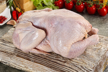 Raw whole chicken for cooking