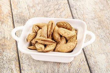 Shelled dry almond nut heap