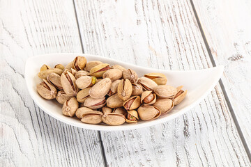 Salted tasty pistachio nuts heap