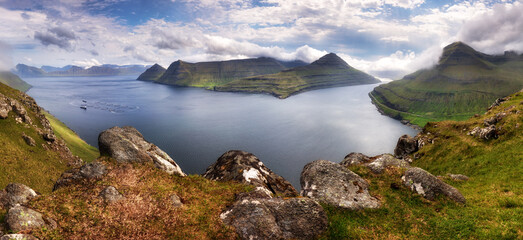 Panorama landscape of spectacular mountains and fjords near the village of Funningur from the...