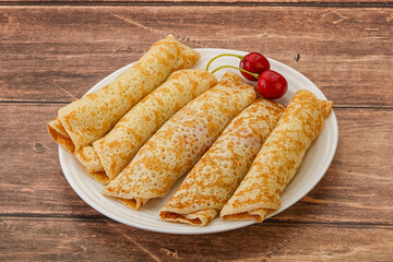 Sweet and tasty pancake with cherry