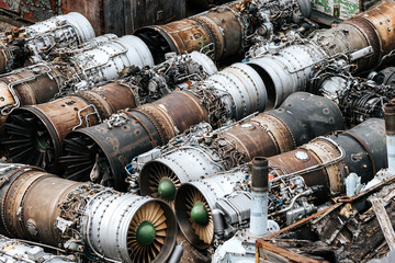 scrap metal dump. old aircraft parts. decommissioned aircraft engines. industry, scrap metal...