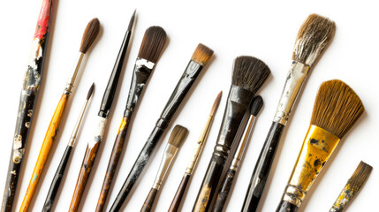 Assorted paintbrushes with paint marks, isolated on white - perfect for art and creativity themes.