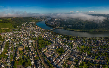 Aerial view of the bustling city of Koblenz-Guls, Germany with tall buildings and the river
