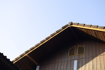 Fototapeta na wymiar House roofs and clear skies.