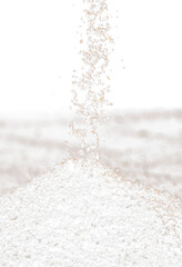 Ground Coffee roasted powder dust fly explosion, Coffee crushed ground float pouring. Roasted Coffee powder ground dust splash explosion in mid Air. Black background Isolated selective focus blur