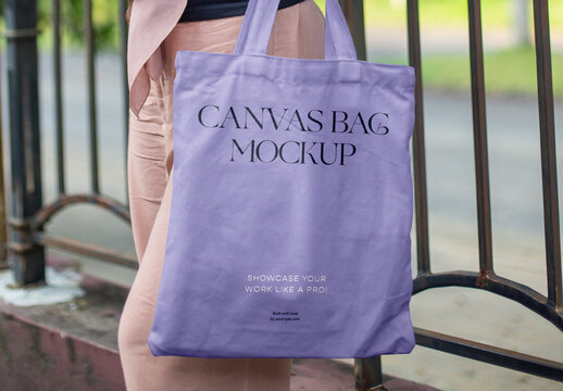 Woman in Park Holding Canvas Bag Mockup