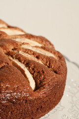 Homemade sliced fruit cake on white background. 