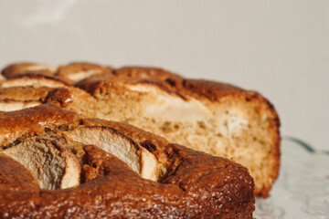 Homemade sliced fruit cake in the pastry shop window.