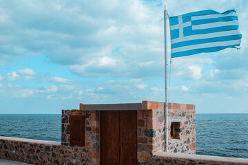 Greek flag on a handle