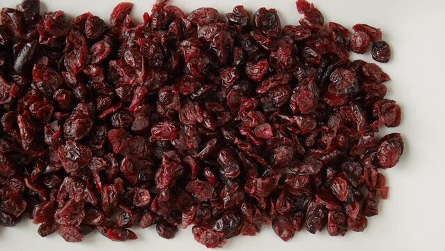 Dried cranberries on a plate.