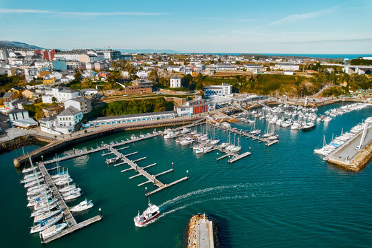 Ribadeo city and harbor with moored vessels. Northern Spain