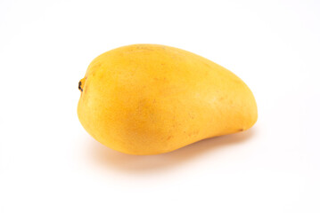 Ripe whole mango isolated on white background.