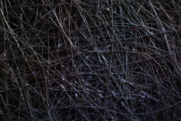 Abstract background. Tangled wire close-up. Macro image of a wire.