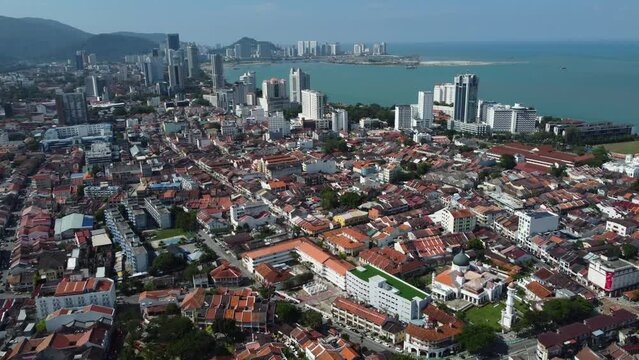 Aerial view of George Town, Penang, Malaysia. The iconic Kapitan Keling mosque is seen at the bottom right.