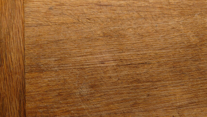 Butt jointed oak cutting board showing knife marks for use as meal prep background 