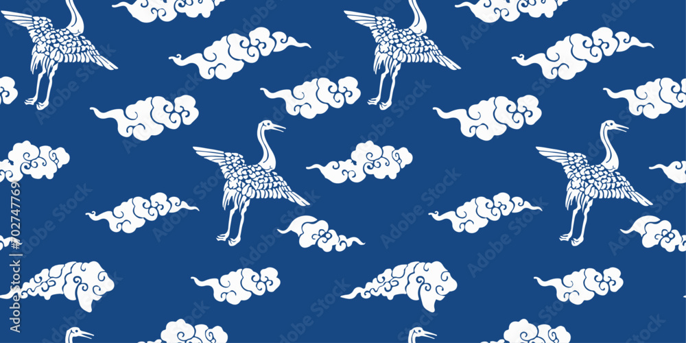 Aufkleber blue background and white shapes of clouds and cranes. traditional japanese motif with cranes and cl