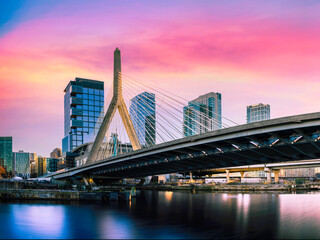 Zakim Bridge and Boston City Skyline over the Charles River at Sunset in Boston, Massachusetts, a...