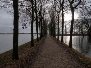 Fototapeta na wymiar Netherlands - 30 december 2023, Amerongen: path alongst Floodplains of the Lower Rhine River