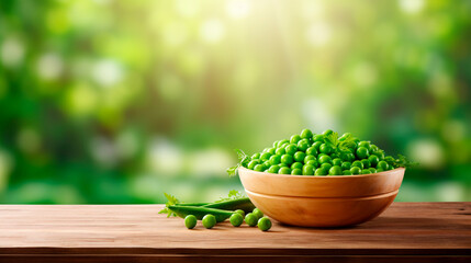 Green peas in a bowl against the backdrop of the garden. Selective focus.