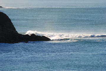 Panorama from above of the coast above Sopelana beach near Bilbao, Spain. Detail of the waves...