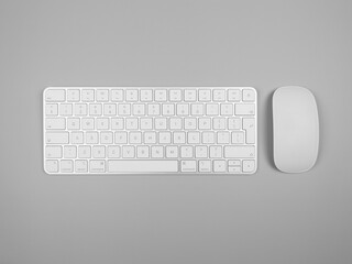 Top view of white keyboard and mouse on light grey background. Modern office flat lay, copy space.