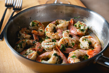 Fried langoustines, shrimp in white wine with garlic and parsley