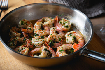 Fried langoustines, shrimp in white wine with garlic and parsley
