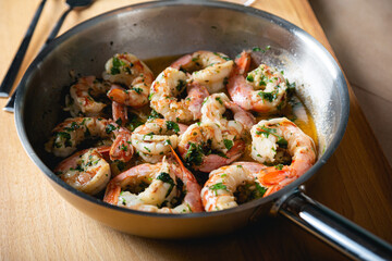 Fried langoustines, shrimp in white wine with garlic and parsley