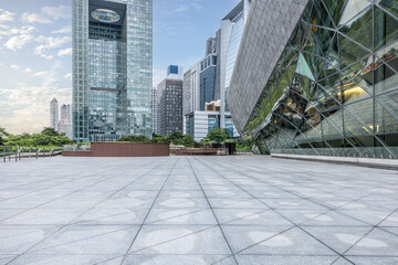 Empty square floor and cityscape in summer