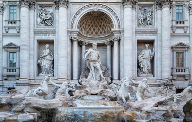 Amazing close-up view of the famous Rome Trevi Fountain (Fontana di Trevi) in morning light, Rome, Italy.