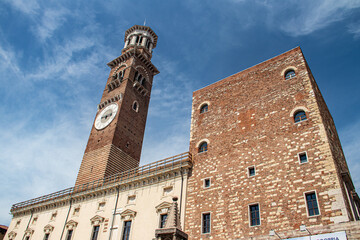 Medieval Lamberti (Torre dei Lamberti) tower XI century with clock, 84 metre and antica ancient...