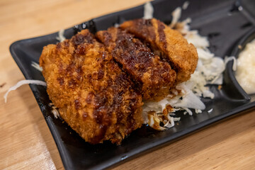 Tonkatsu, Fried Pork with sliced cabbage served on plate