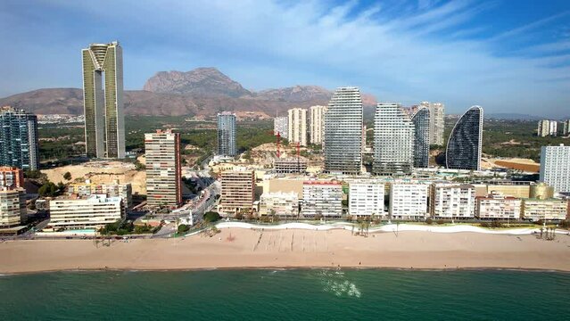 Benidorm city of Costa Blanca, Spain. Aerial drone panoramic high angle view, coastal cityscape panorama. 4k hd drone footage