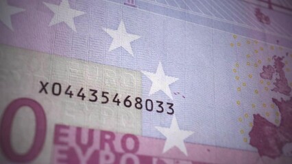 Close-up of a European Union five hundred euro banknote. A slide shot of the detailed macro texture of a five hundred euro banknote. Detailed view of part of the banknote. - Powered by Adobe