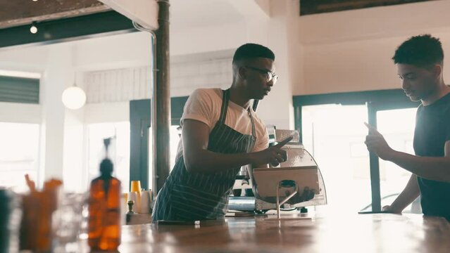 Tablet, cashier and customer order at cafe with menu, online choice and information or services at counter. Barista or man with thumbs up at a coffee shop and digital technology for b2c management