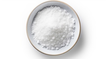 Salt on a plate seen from above isolated on white background