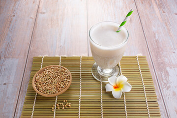 Vegan Buckwheat milk and buckwheat groats.Non dairy alternative milk. Healthy vegetarian food and...