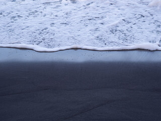 beach with black volcanic sand on  Tenerife