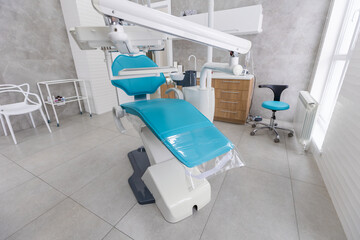 Modern Dental office. equipment at dental office. Dental chair and other accessories. Dental clinic equipment.