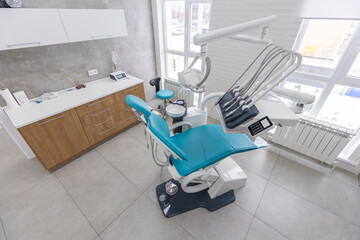 Modern Dental office. equipment at dental office. Dental chair and other accessories. Dental clinic equipment.