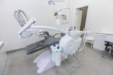 Fototapeta na wymiar Modern Dental office. equipment at dental office. Dental chair and other accessories. Dental clinic equipment.