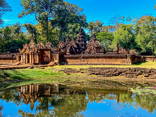 Fototapeta na wymiar Banteay Srei Temple was built in honor of the god Shiva, a temple of the Khmer civilization, located on the territory of Angkor in Cambodia