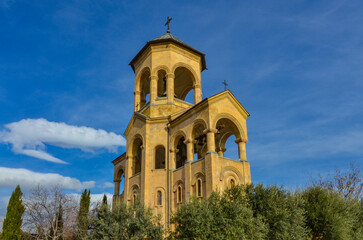 Fototapeta na wymiar bell tower of Sameba complex in Avlabari district of Tbilisi, Georgia